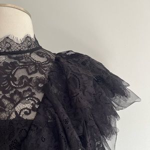 Long voluminous dress with black lace ruffle bodice and animal print skirt